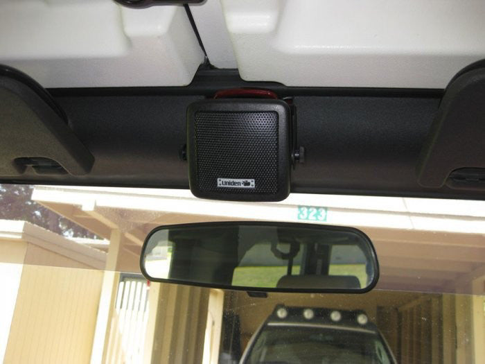 Compact External CB Radio Speaker Installed Above Mirror